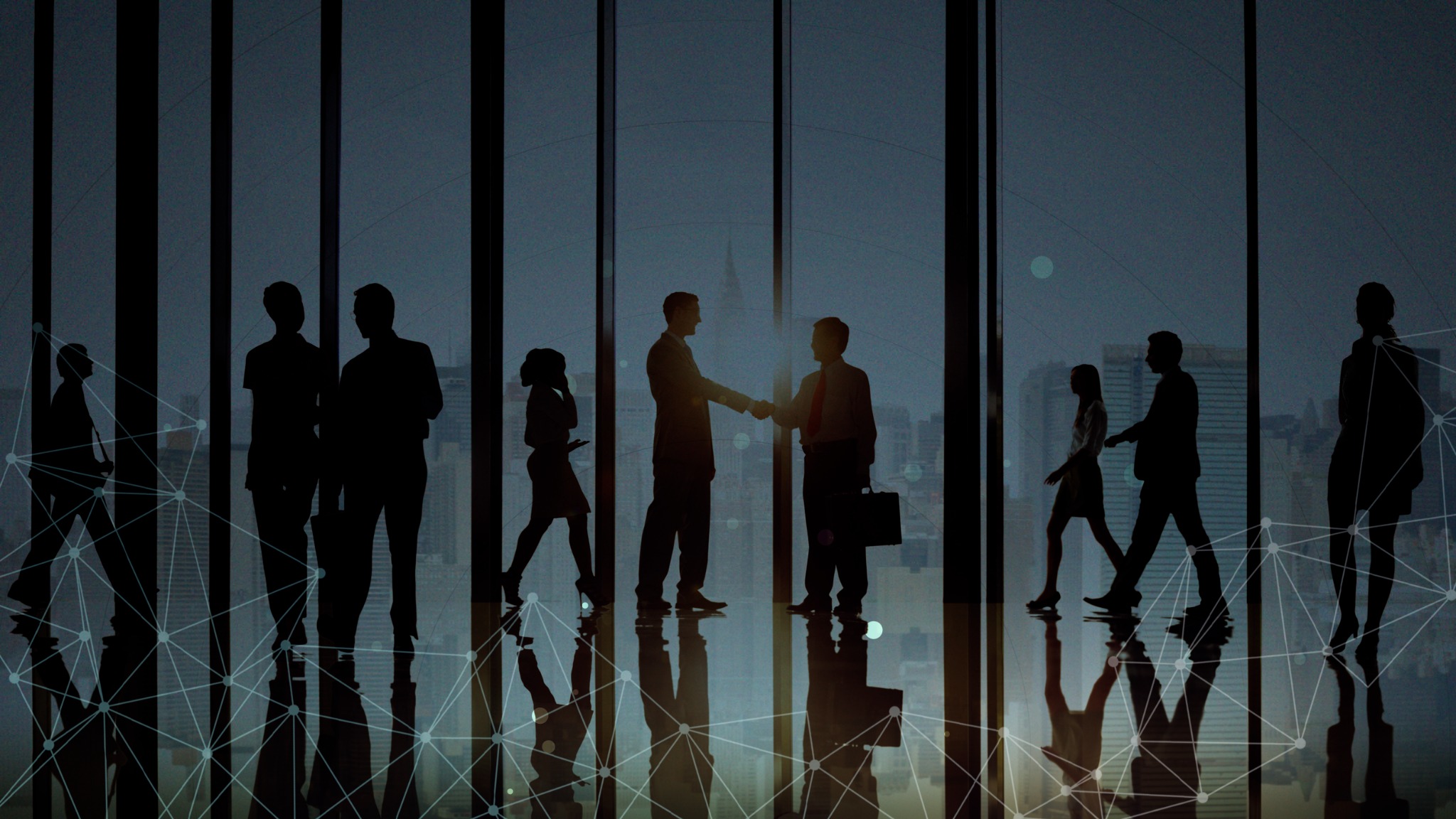 Business professionals meeting in a connected workplace